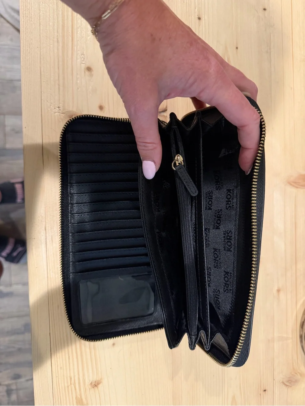 Michael Kors Black Pebbled Leather Zip Wallet with Gold Plate